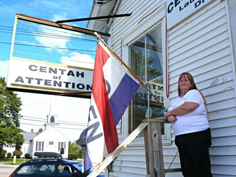 Juanita Kristoff waits for customers in front of Centah of Attention at Boothbay Center. “My customers are the best part of this work,” Kristoff said. “I’ll miss them the most.” KATRINA CLARK/Boothbay Register